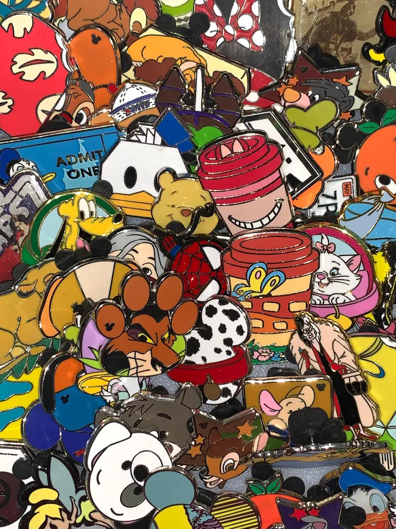 Disney pin collection display showing authentic trading pins from Disney Parks